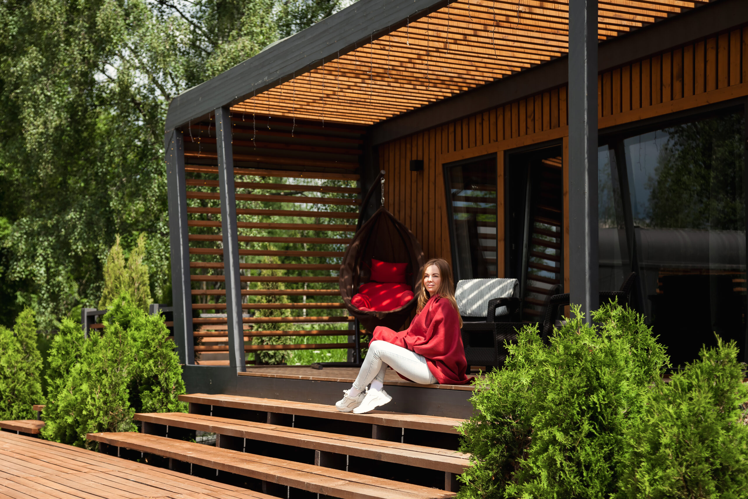 Enjoying Nature at Cozy Cabin in Summertime, Woman Resting
